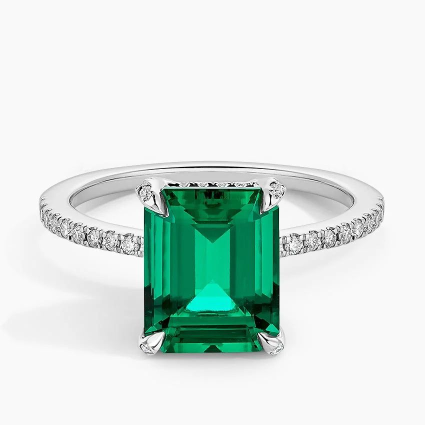 14kt White Gold with Natural Emerald 1.5ct and with 0.25 ct Natural Diamond.